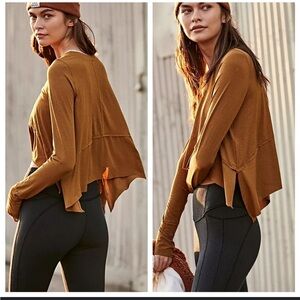 FP Movement atlas Mustard colored workout top